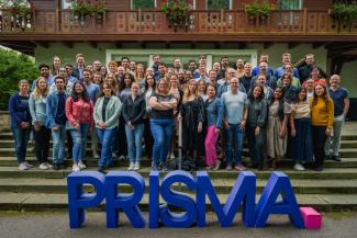 people as a group behind PRISMA letters